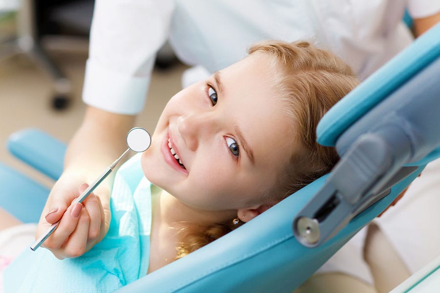 child in dentist's chair